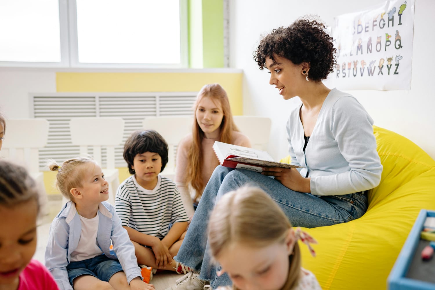 Teacher teaching child